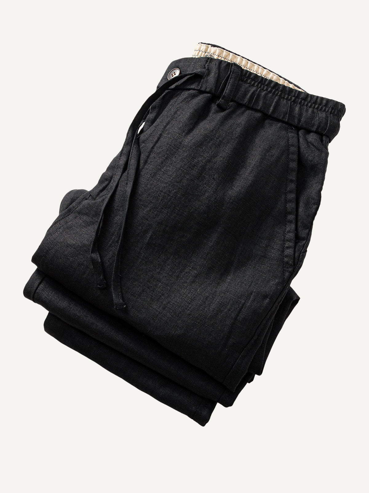 Folded view of OROMEN Crosshatch Weave Drawstring Trousers