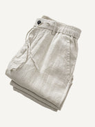 Folded view of OROMEN Crosshatch Weave Relaxed Trousers