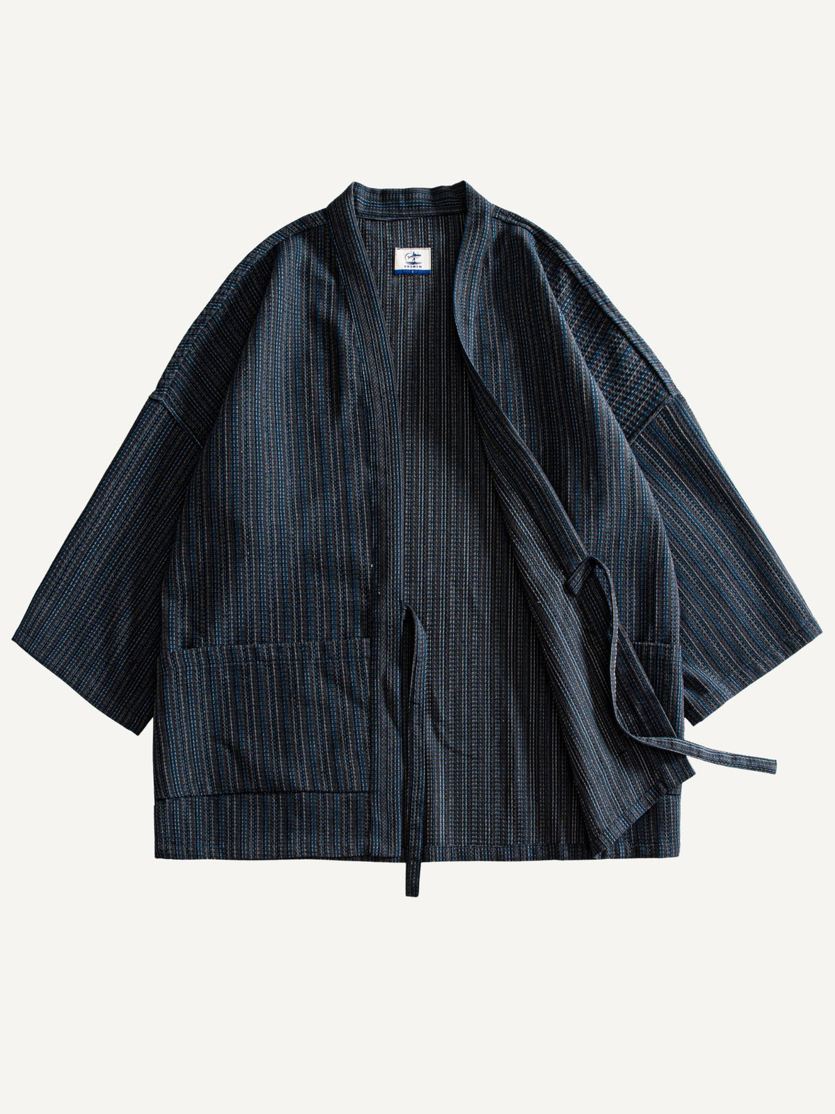 Front flat lay of OROMEN textured tie-front kimono cardigan with one side open