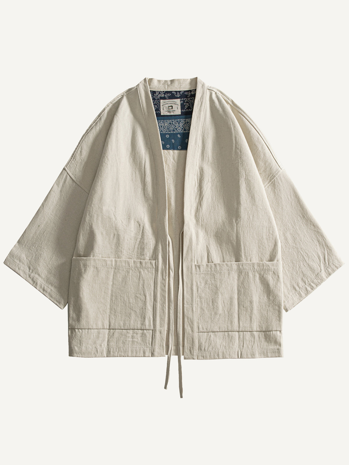 Front flat lay view of OROMEN Vintage-Style Kimono Cardigan Jacket in beige with tie front