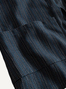 Front pocket detail of OROMEN textured tie-front kimono cardigan