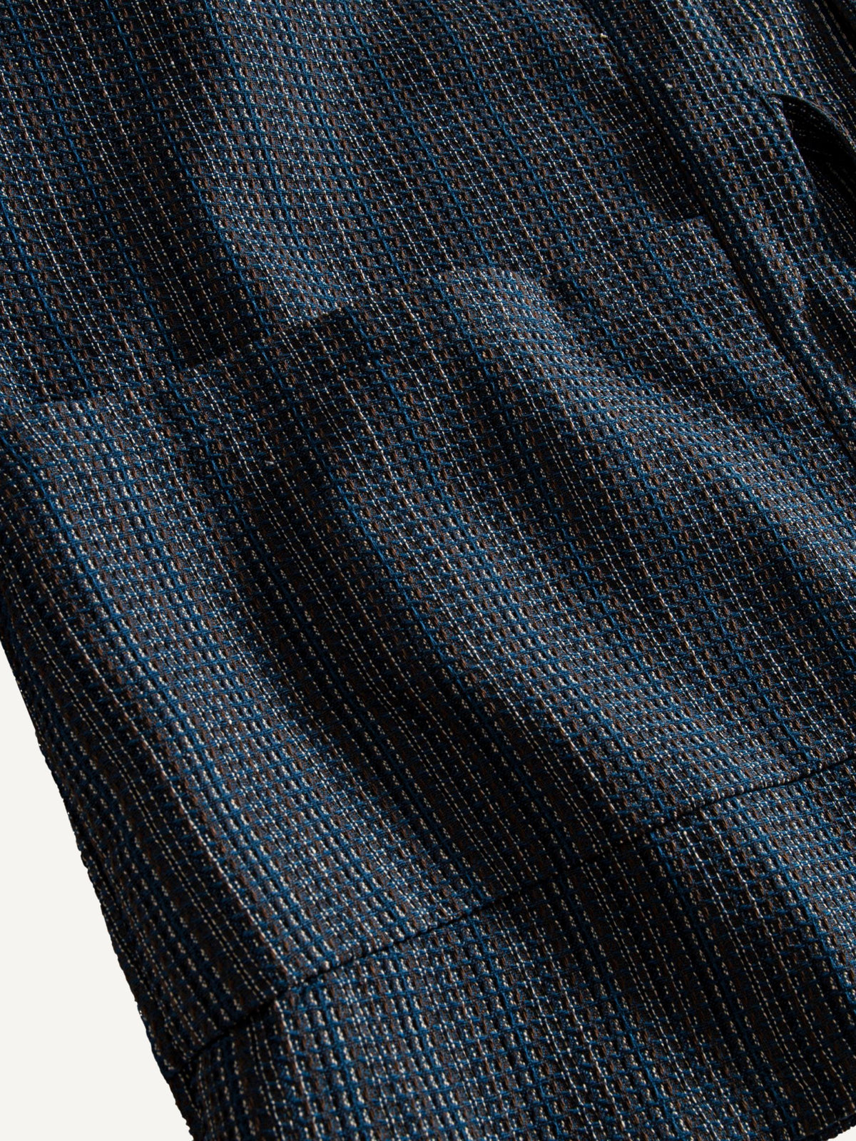 Front pocket detail of OROMEN textured tie-front kimono cardigan