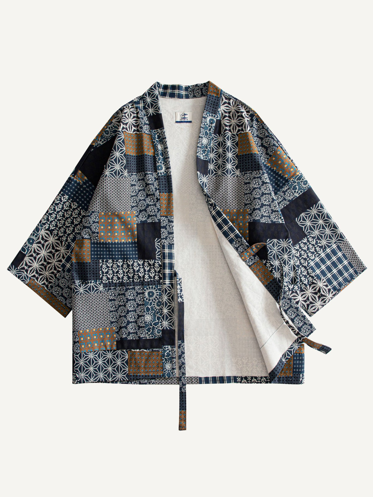 Front view of Indigo Asanoha Patchwork Haori Jacket draped open to reveal ecru contrast inner lining