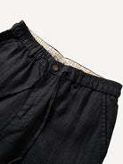 Front waistband detail of OROMEN Crosshatch Weave Drawstring Trousers with drawcord