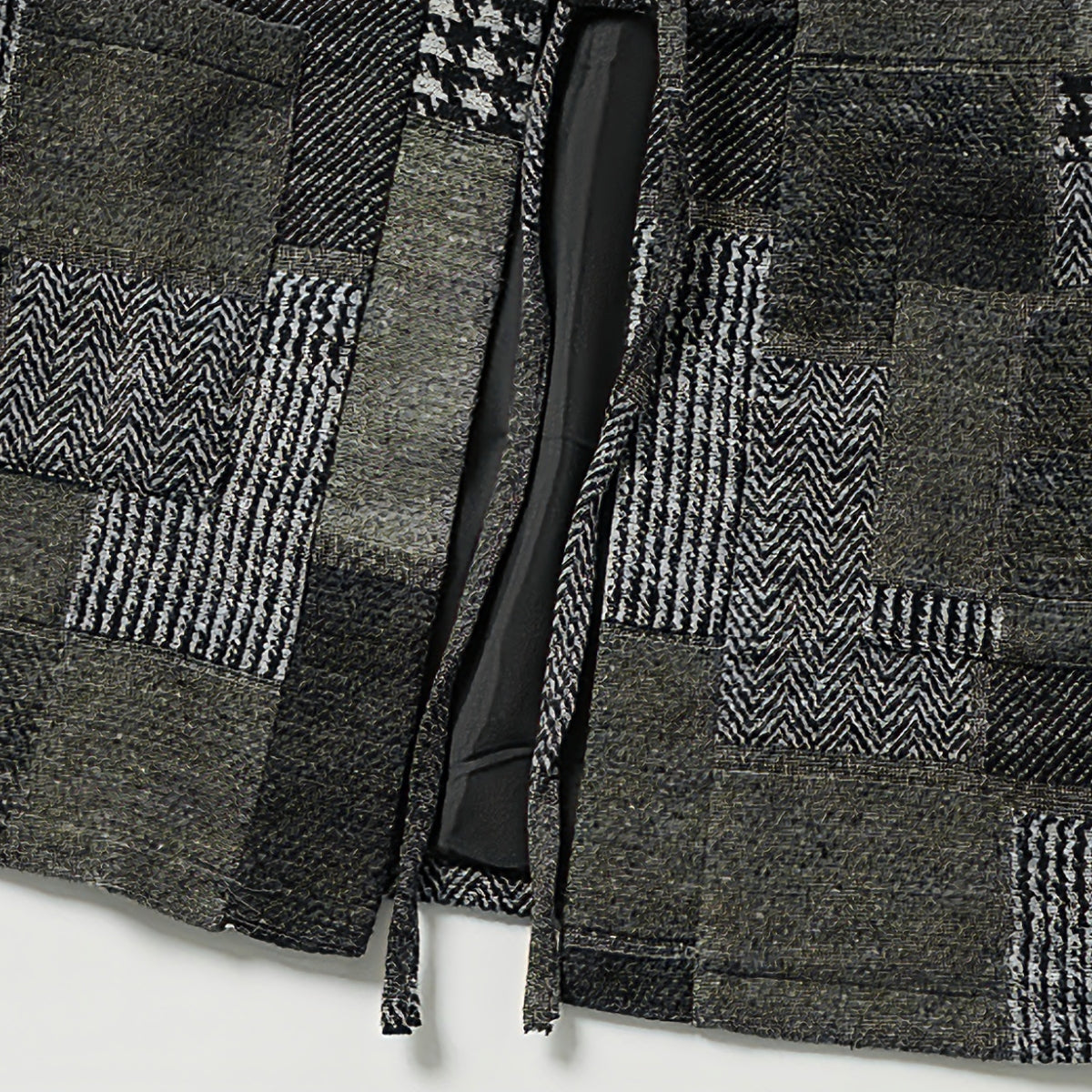 Hem detail of OROMEN KIMONO021 Patchwork Houndstooth Kimono Jacket, clean finished hem edge, grey patchwork panel construction