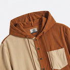Hood‑interior‑and‑OROMEN‑brand‑label‑close‑up‑on‑rust‑and‑beige‑corduroy‑hooded‑shirt