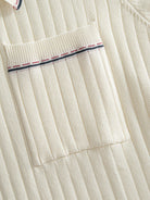 Left chest pocket detail on OROMEN Cream Court Knit Polo