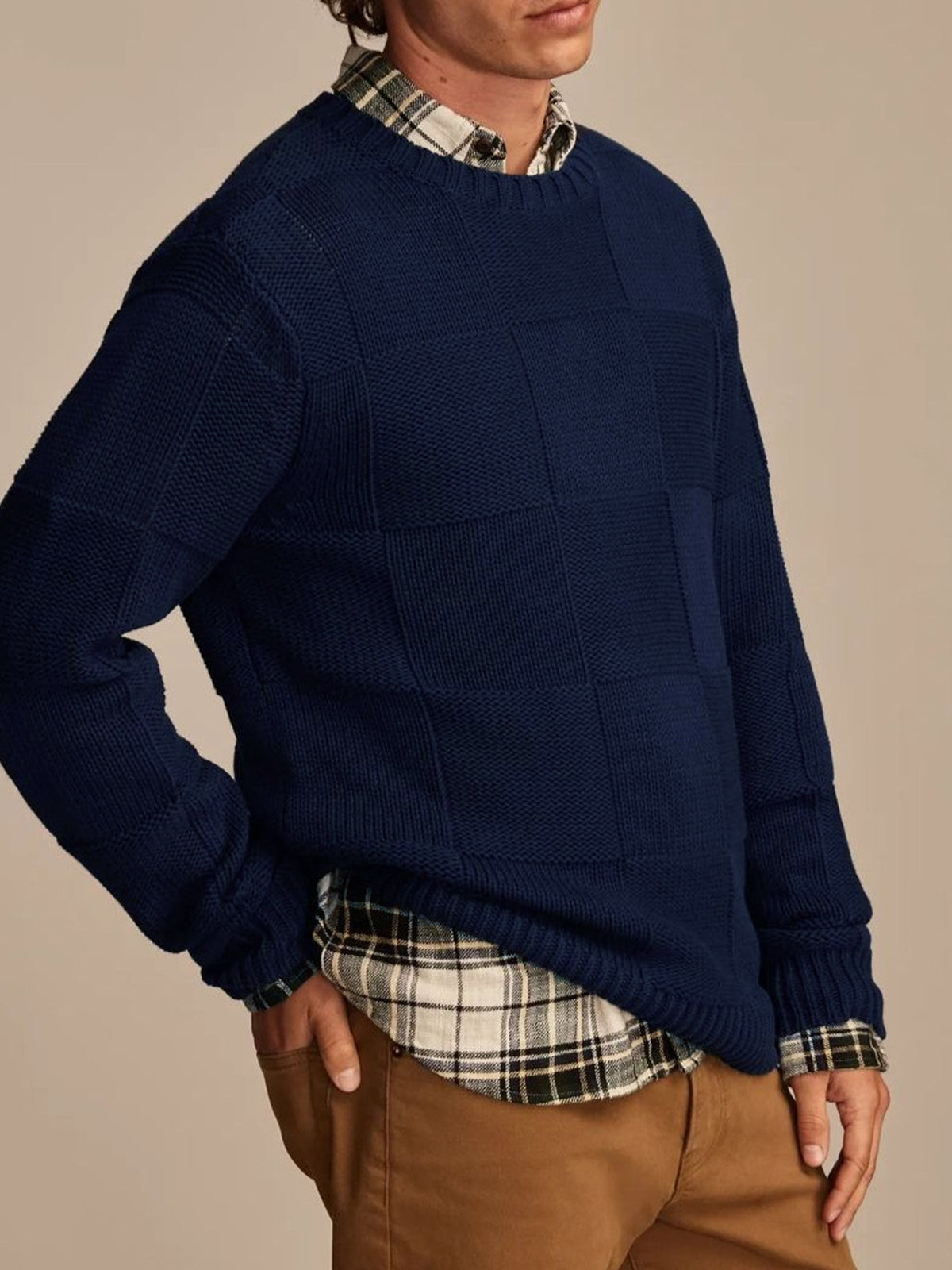 Lifestyle model wearing OROMEN Grid Texture Knitted Sweater