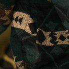 Macro detail of OROMEN KIMONO018 jacquard brushed fabric, navy woven threads, raised texture surface, 100% cotton Japanese craftsmanship