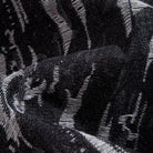Macro detail of jacquard crackle fabric, OROMEN KIMONO015, black and charcoal woven texture