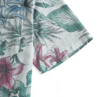 Midsummer green linen shirt flat lay showing full botanical pattern design