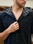 Model showcasing collar and plaid hood of OROMEN Lodge Corduroy Hooded Shirt