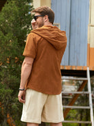 Model standing wearing OROMEN Canyon Corduroy Hooded Shirt