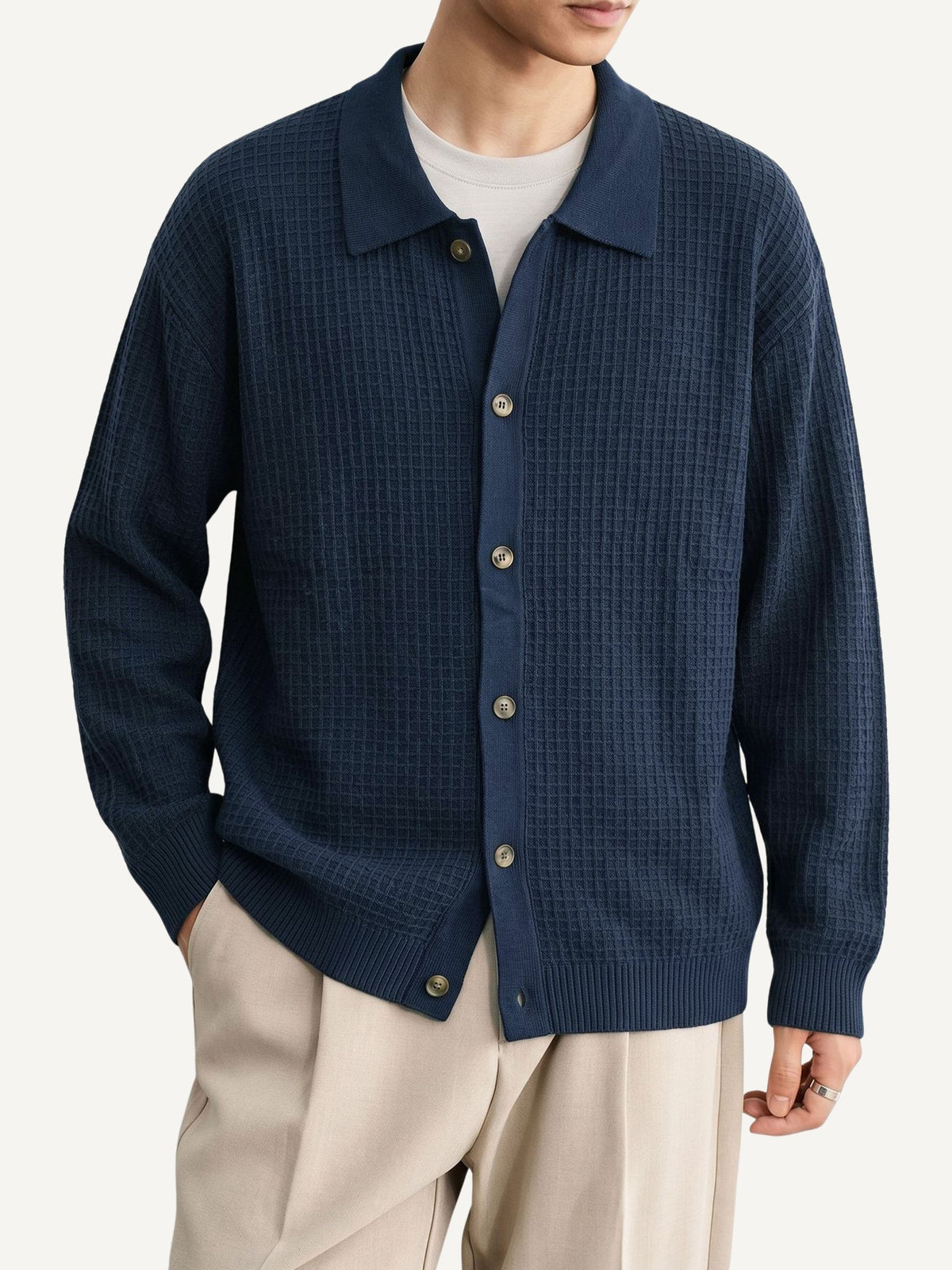 Model wearing OROMEN indigo Ribbed Polo Collar Knit Cardigan in smart casual fit