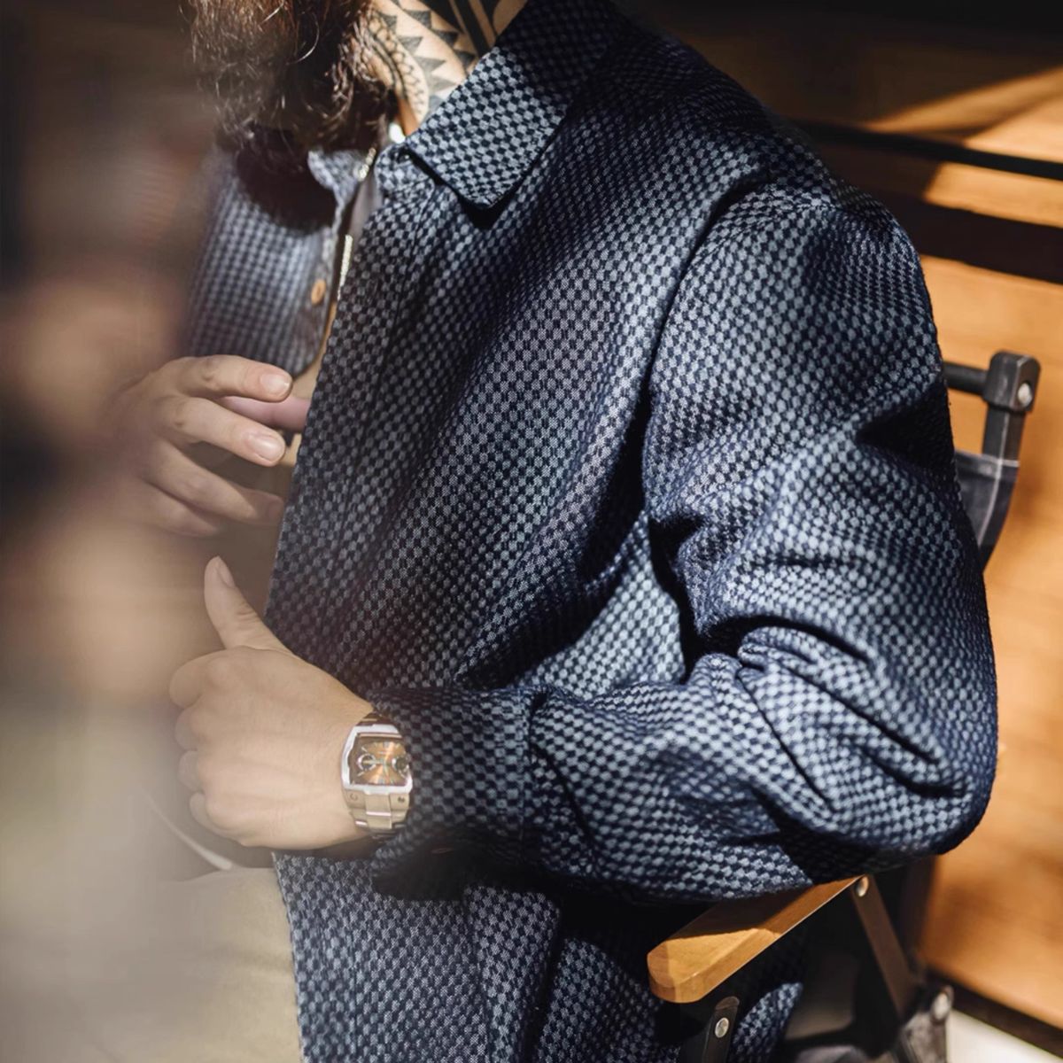 Model wearing OROMEN OROAW042 Checkered Jacquard Shirt, side view, navy jacquard check, relaxed silhouette, casual styling