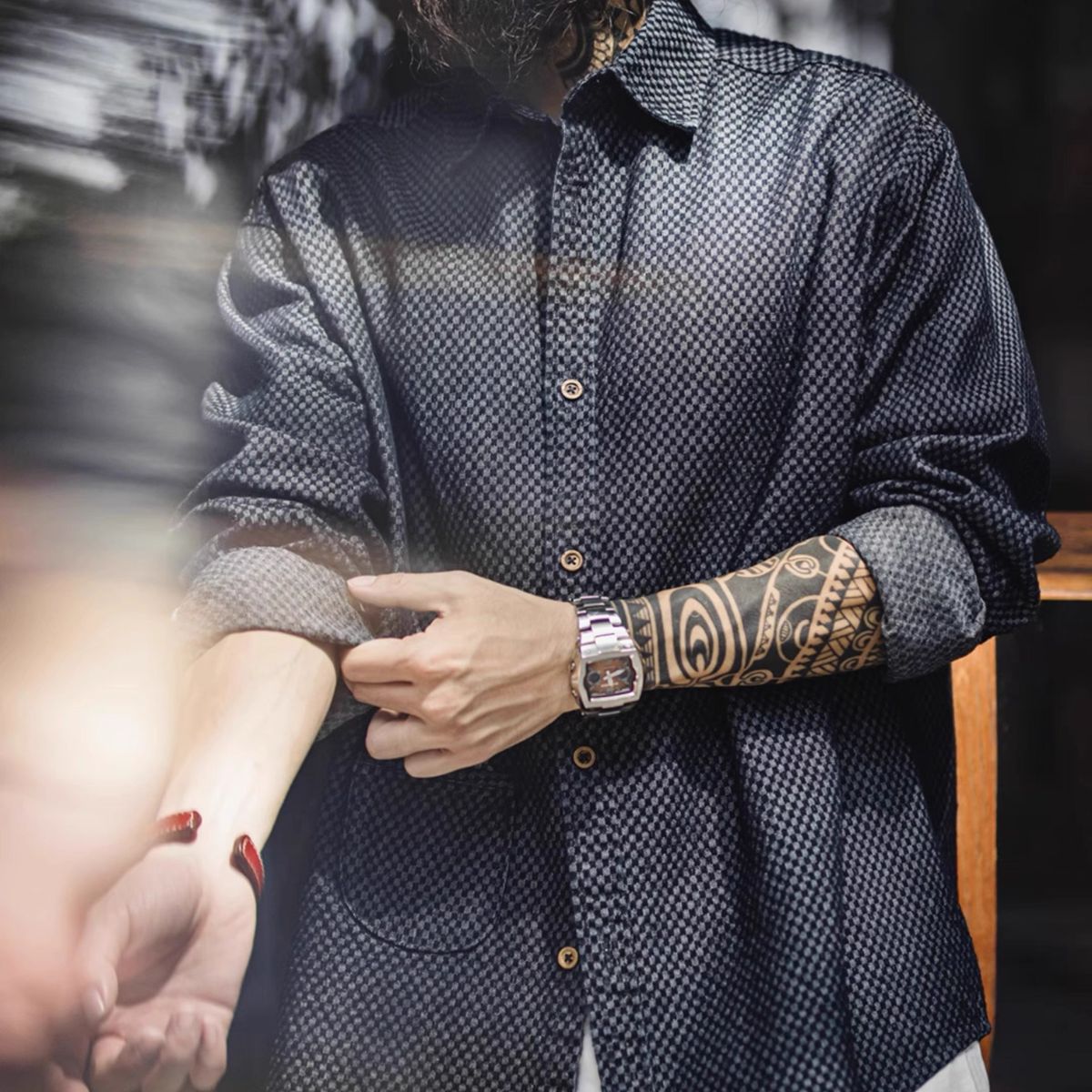 Model with rolled sleeves wearing OROMEN OROAW042 Checkered Jacquard Shirt, navy blue check, casual summer styling detail