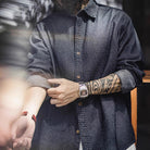 Model with rolled sleeves wearing OROMEN OROAW042 Checkered Jacquard Shirt, navy blue check, casual summer styling detail