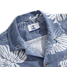 Monstera Deliciosa shirt close-up showing hand-painted botanical leaf details