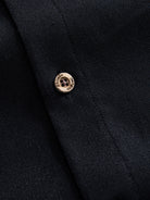 Natural coconut button closure detail of OROMEN Ink Wash Cotton-Linen Shirt
