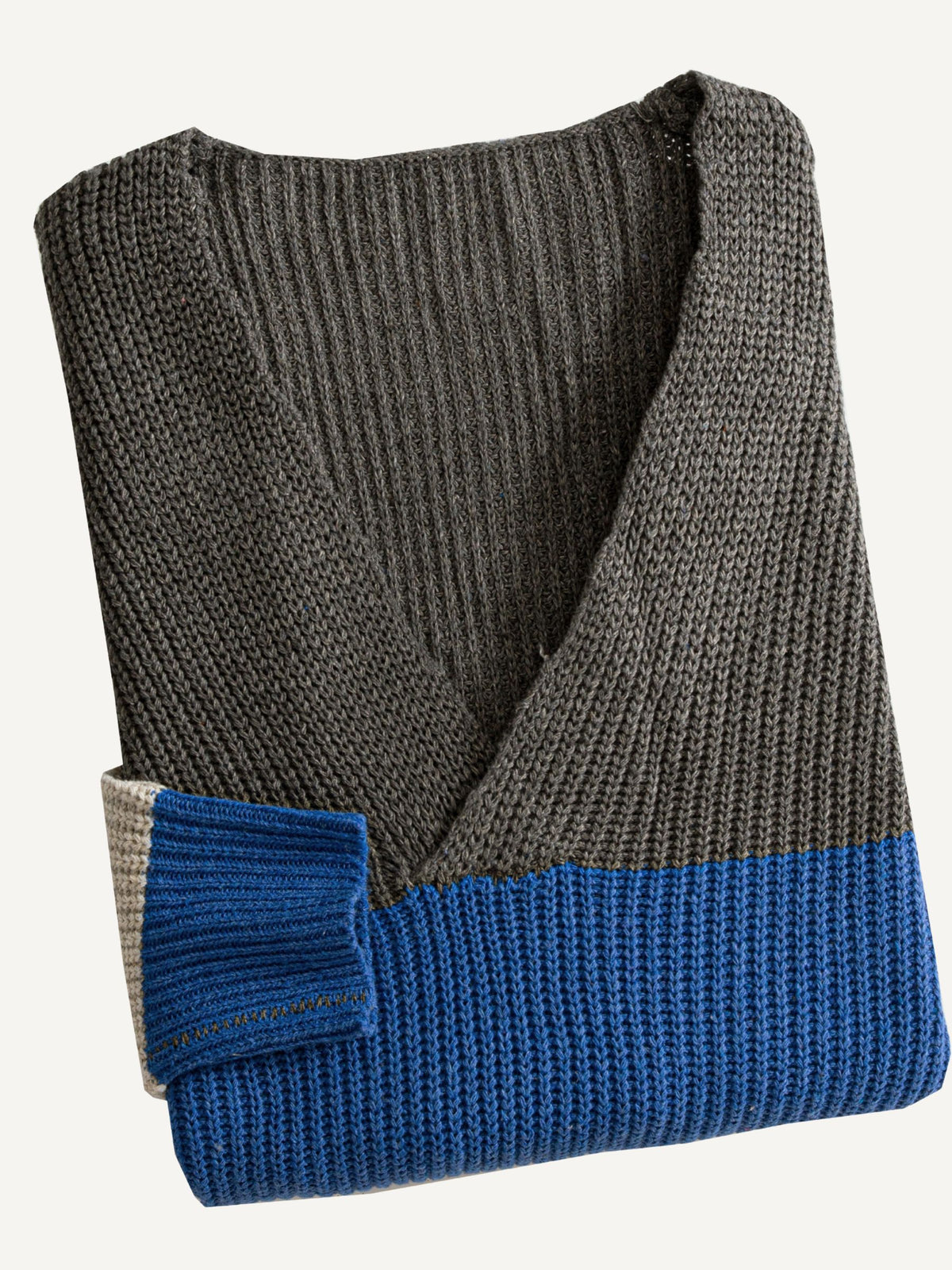 Neatly folded OROMEN Coastline Stripe Jumper Sweater showcasing wide rugby stripes and knit texture