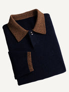 Neatly folded OROMEN Contrast Collar Knit Polo Sweater highlighting collar trim and knit texture