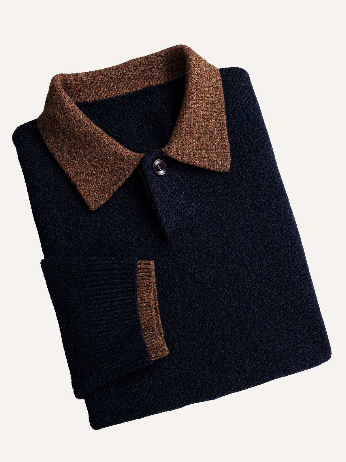 Neatly folded OROMEN Contrast Collar Knit Polo Sweater highlighting collar trim and knit texture
