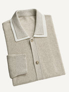 Neatly folded OROMEN Contrast Polo Collar Sweater Cardigan highlighting layered collar and ribbed knit texture