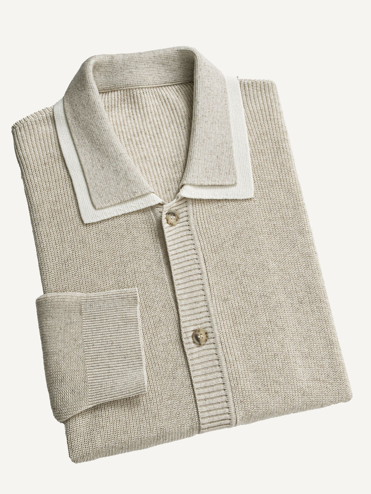 Neatly folded OROMEN Contrast Polo Collar Sweater Cardigan highlighting layered collar and ribbed knit texture