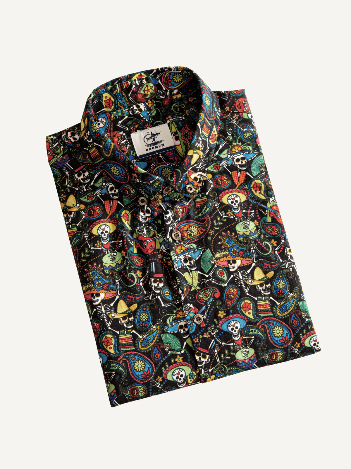 Neatly folded OROMEN Sugar Skulls cotton button-down shirt