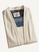 Neatly folded OROMEN Vintage-Style Kimono Cardigan Jacket highlighting collar and slub cotton texture