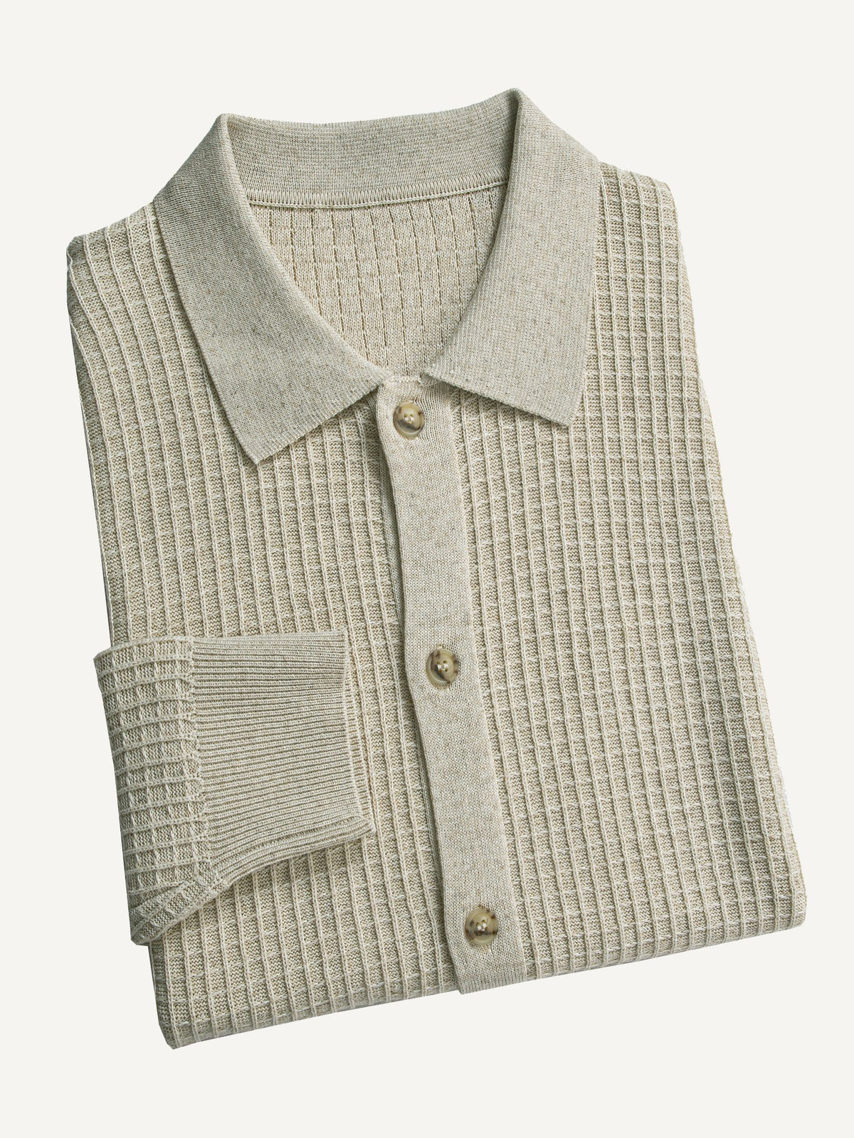 Neatly folded beige Ribbed Button-Down Sweater Cardigan by OROMEN