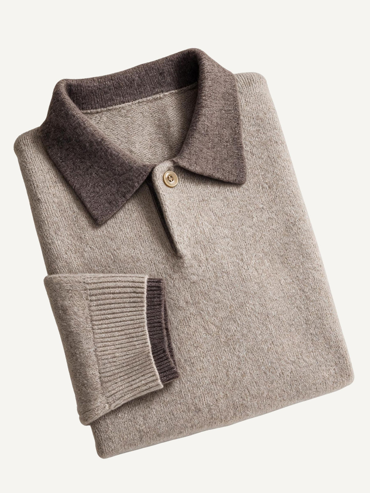 Neatly folded presentation of OROMEN Contrast Collar Knitted Sweater