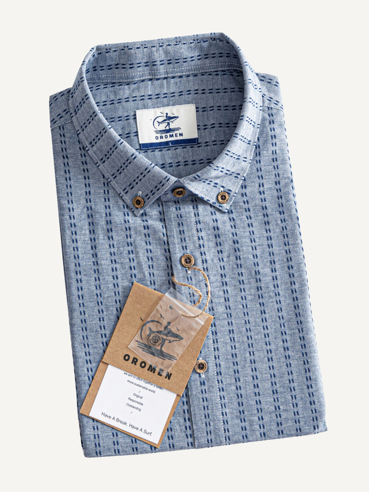 Neatly folded presentation of OROMEN Sashiko Chambray Cotton Shirt