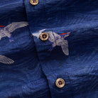 OROMEN Arctic Tern Shirt — close-up of OROMEN engraved coconut buttons and arctic tern print