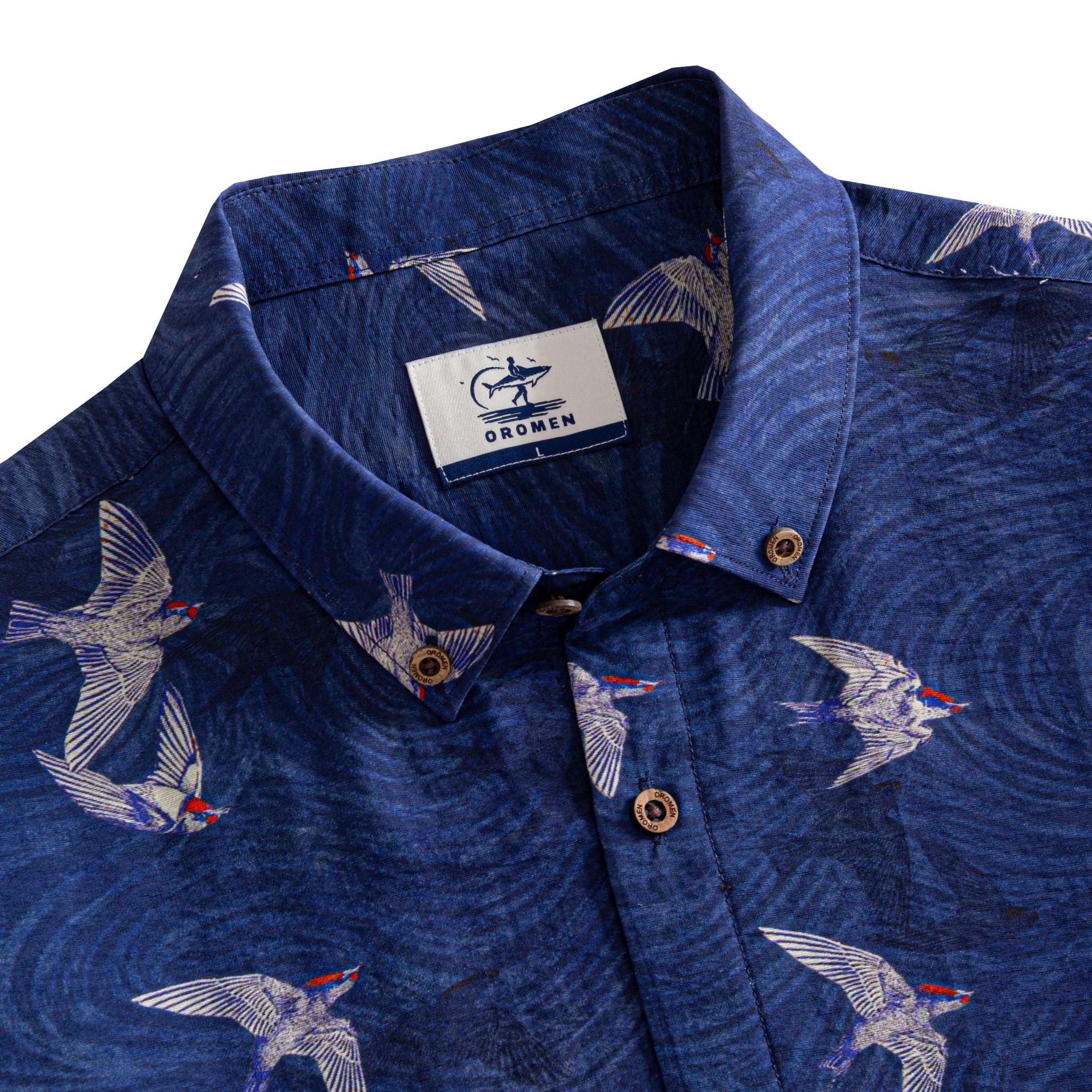 OROMEN Arctic Tern Shirt — close-up of button-down collar and OROMEN label, coconut buttons detail