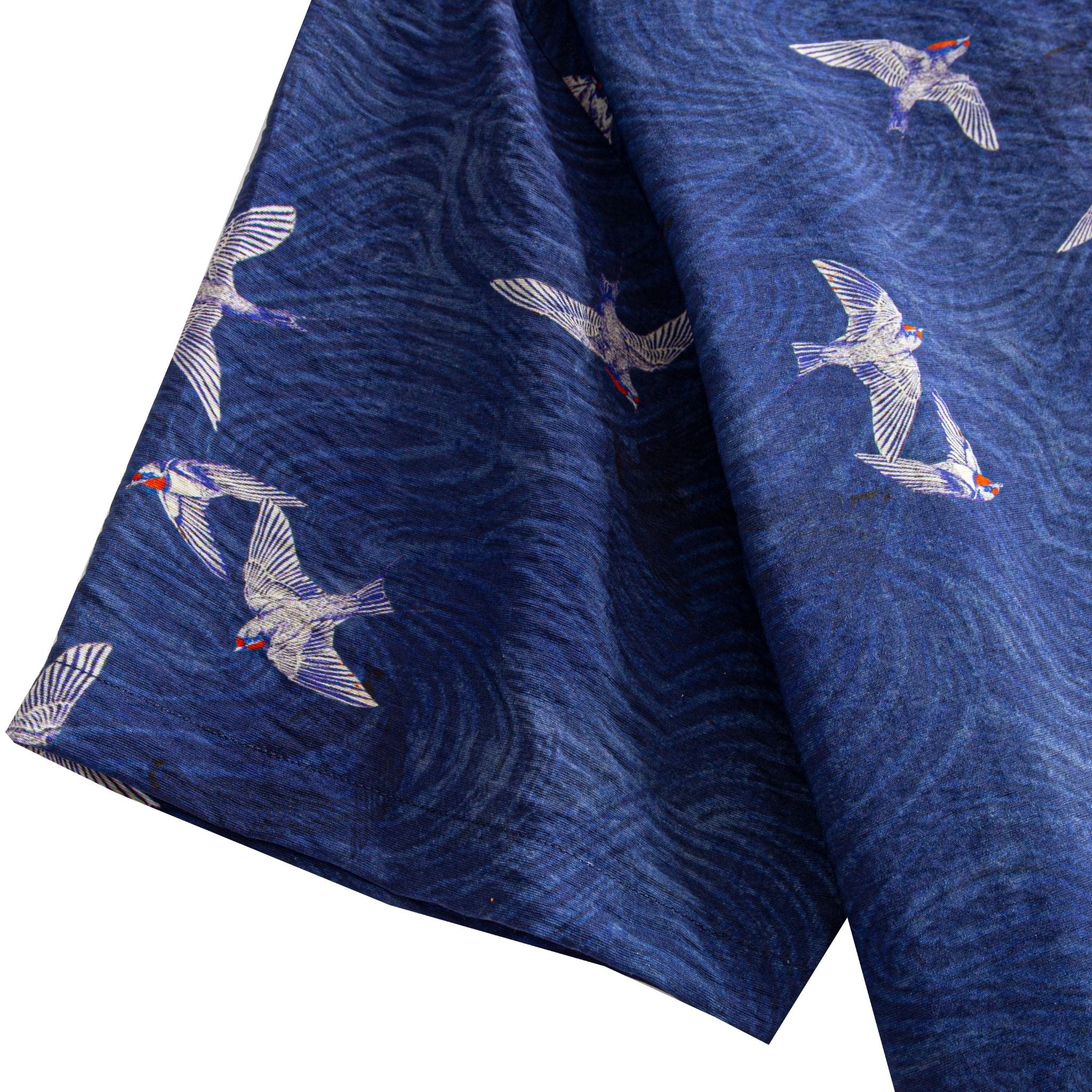 OROMEN Arctic Tern Shirt — sleeve and hem detail showing arctic tern print on navy wave texture fabric