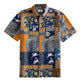 OROMEN Aviary Patchwork Hawaiian shirt front flat lay showing full patchwork block layout with peacocks, folk birds and botanical motifs in navy blue and amber orange
