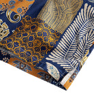 OROMEN Aviary Patchwork shirt side vent detail showing fern leaf, paisley and Persian carpet patchwork panels with double needle stitching
