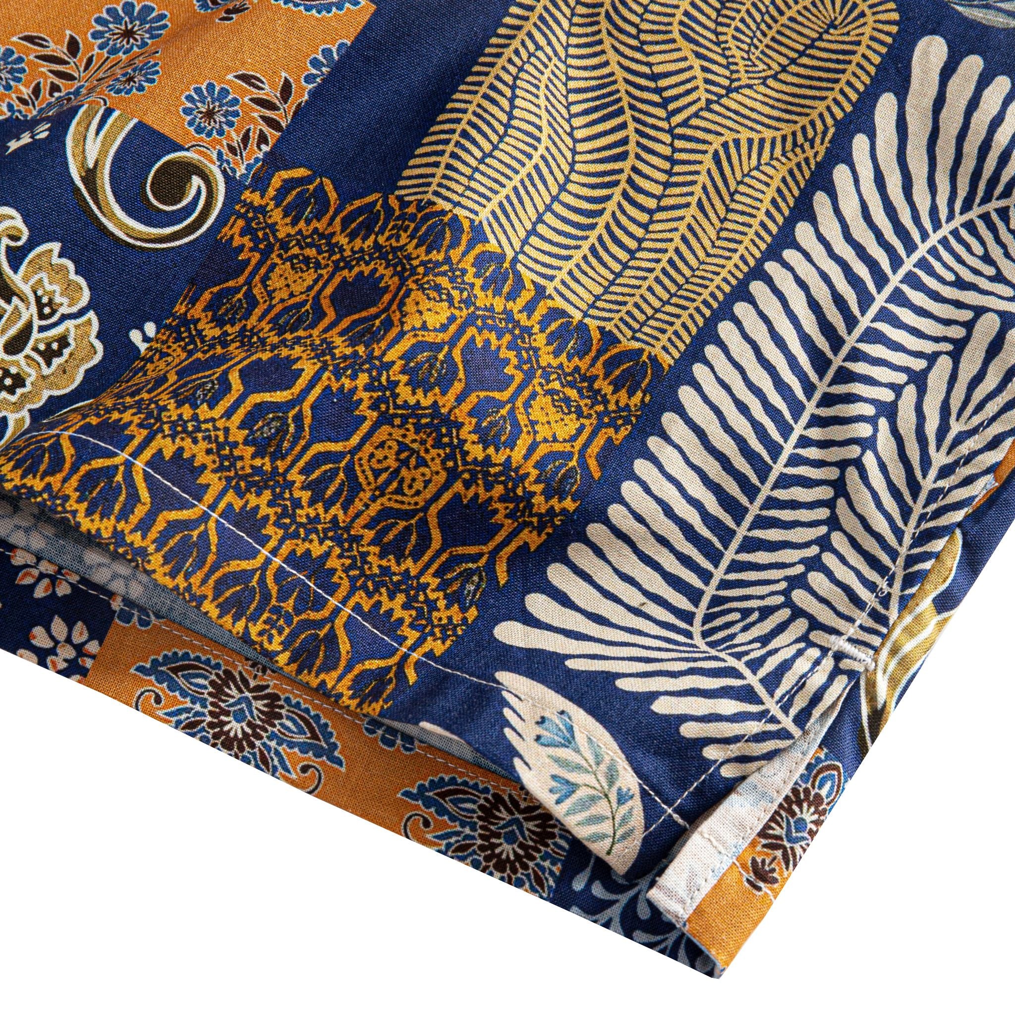 OROMEN Aviary Patchwork shirt side vent detail showing fern leaf, paisley and Persian carpet patchwork panels with double needle stitching