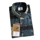 OROMEN Bandana Patchwork shirt folded with branded tag and coconut buttons, indigo black off-white paisley patchwork