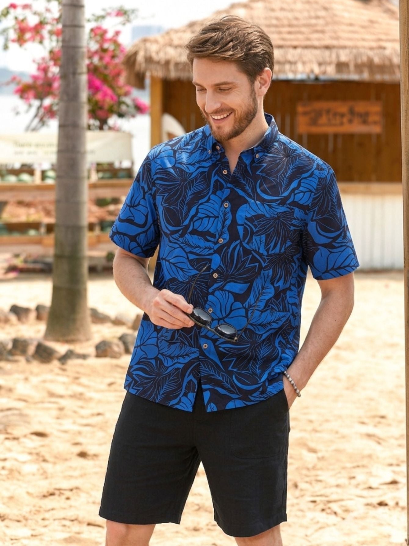 OROMEN Blue Bush Hawaiian shirt front view – navy blue tropical botanical print