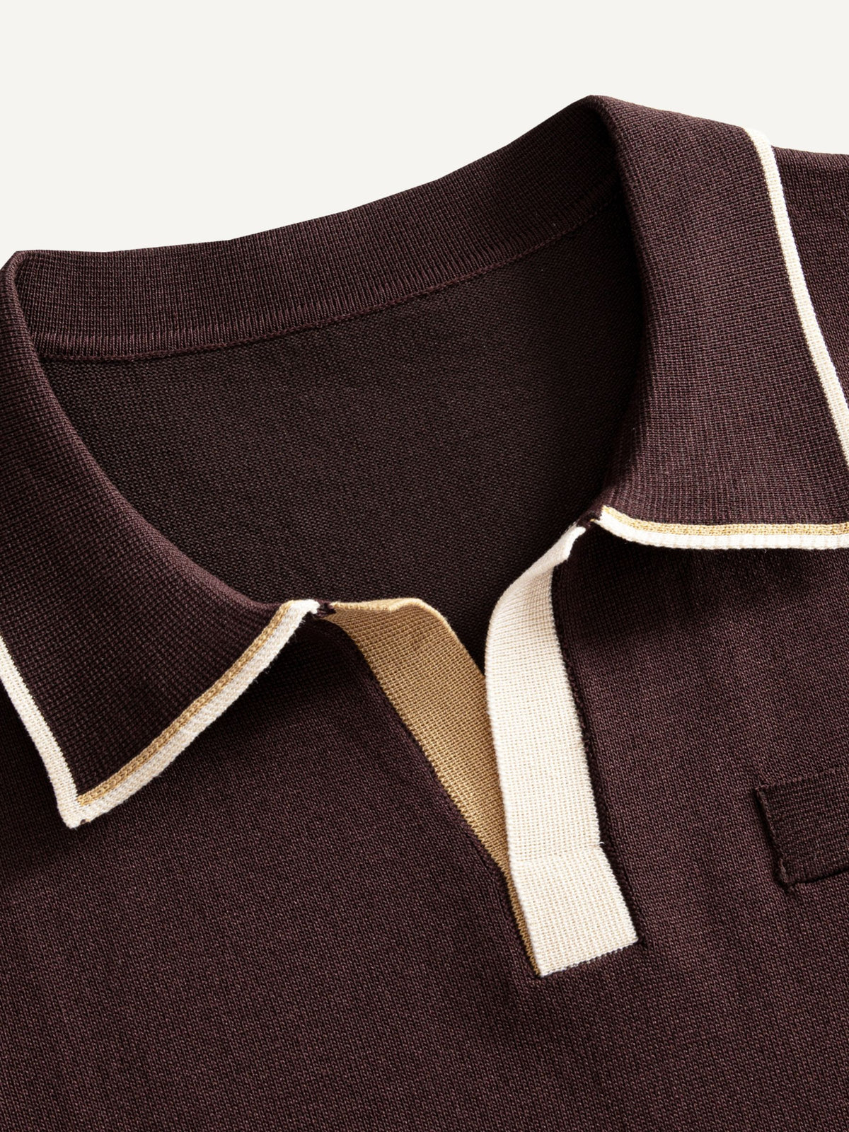 OROMEN Casa Mocha Knit Polo collar detail showing open buttonless placket with contrast tipping