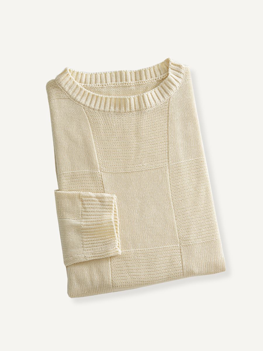 OROMEN Checkerboard Textured Sweater neatly folded flat lay showing rich cream white texture