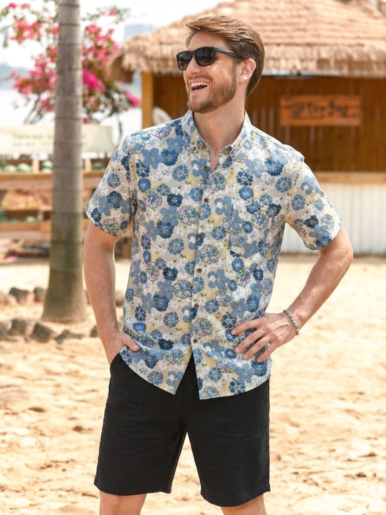 OROMEN Cherry Blossom Shirt, front panel with a muted pattern, off-white base with blue cherry blossom print.
