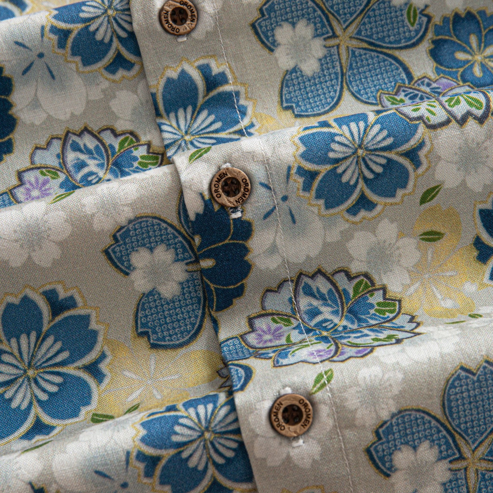 OROMEN Cherry Blossoms in Full Bloom shirt branded coconut button close-up