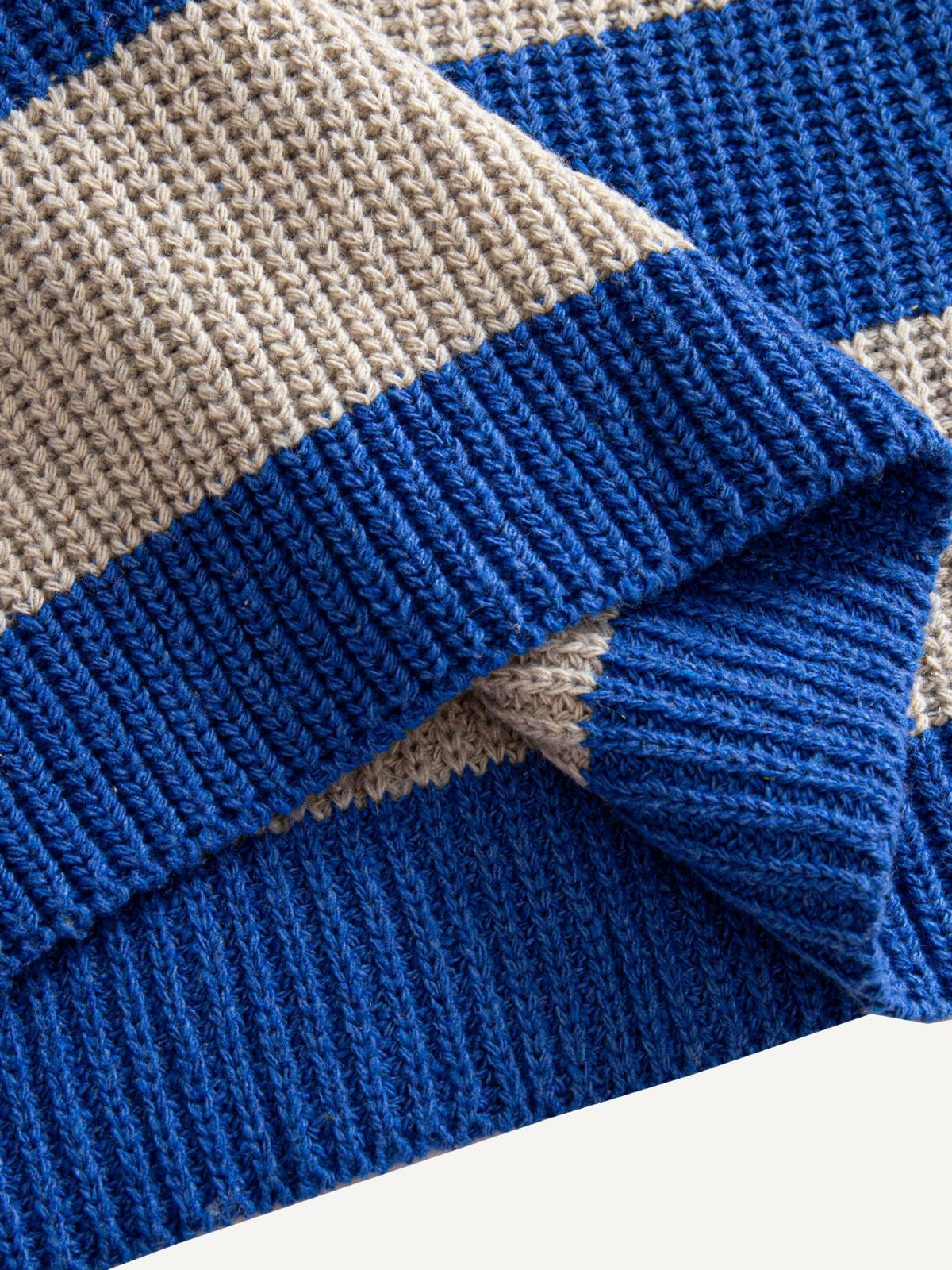OROMEN Color-Block Striped V-Neck Sweater hem detail showing structured ribbed knit finish
