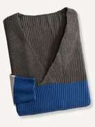 OROMEN Color-Block Striped V-Neck Sweater neatly folded flat lay displaying crossover neck and stripes