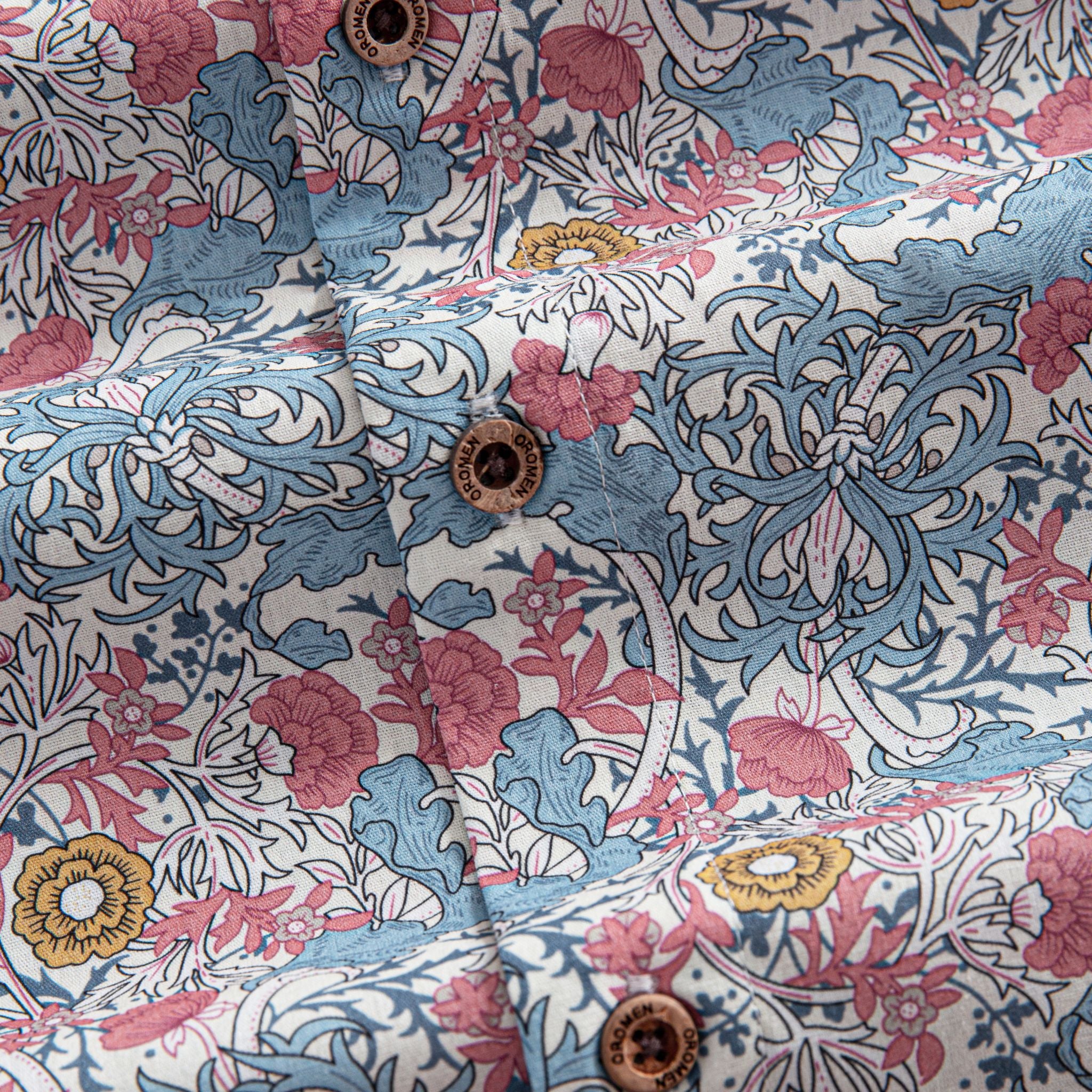 OROMEN Floral Garden Shirt – Branded Coconut Button Close-Up, Floral Print Cotton Fabric