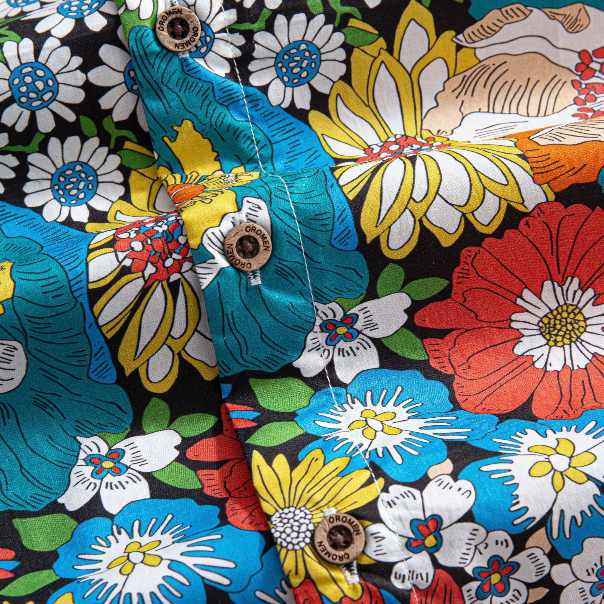 OROMEN Flower Riot Shirt – Button Placket Close-up, OROMEN Engraved Coconut Buttons, Vibrant Floral Print