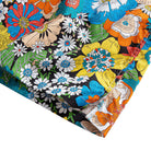 OROMEN Flower Riot Shirt – Hem and Side Seam Detail, Retro Floral Print on Black
